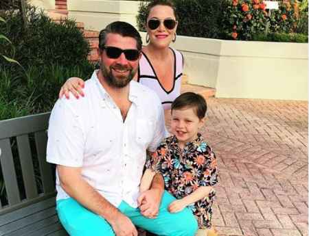 S.E Cupp with her husband and son